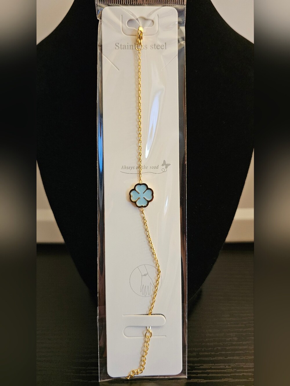 Gold Stainless Steel Bracelet with Light Blue Flower Charm